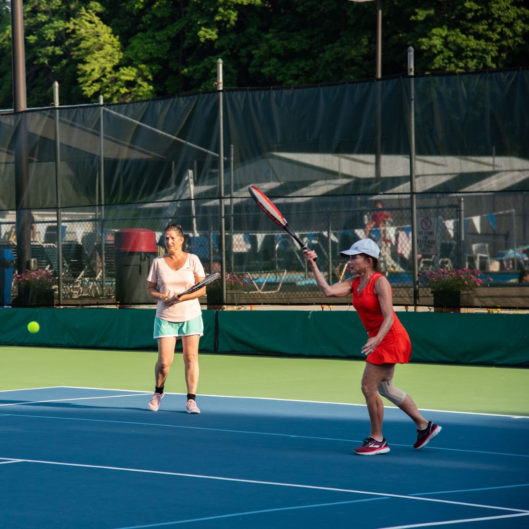 ladies playing tennis